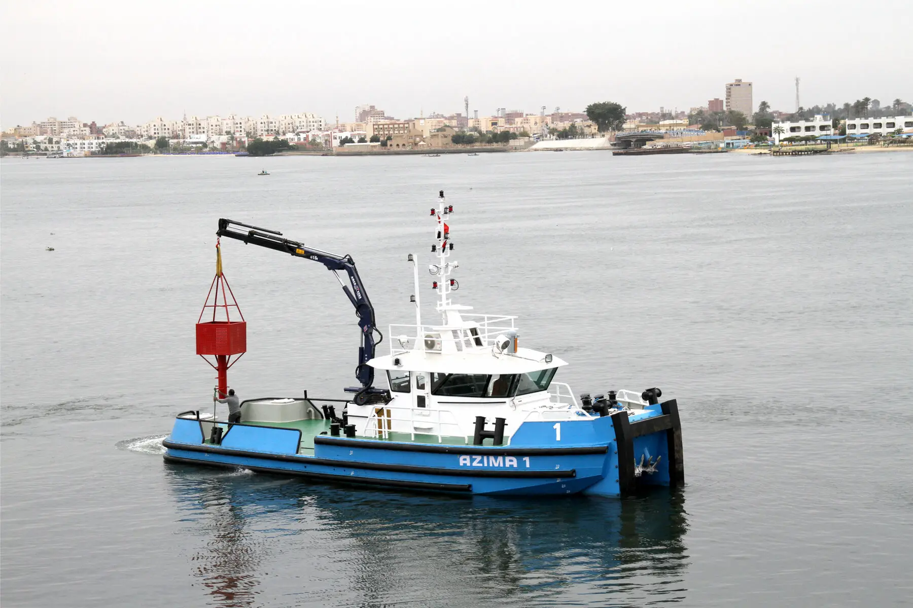 The workboat AZIMA 1 in harbour